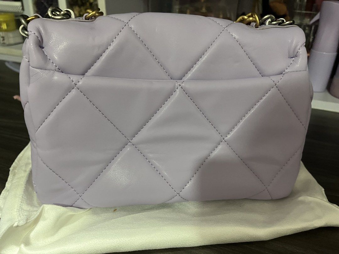 Purple Quilted Leather Chain Shoulder Bag (Category: Shoulder Bags) located in Pasig City. Submitted by melaiski28 (Listing ID 1445311980, Image 2). Description: - Adorable purple shoulder bag - Quilted leather material - Chic gold chain strap - Secure twist lock closure - Interior zippered pocket for essentials - Comes with original dust bag - Ideal for going out and special occasions.