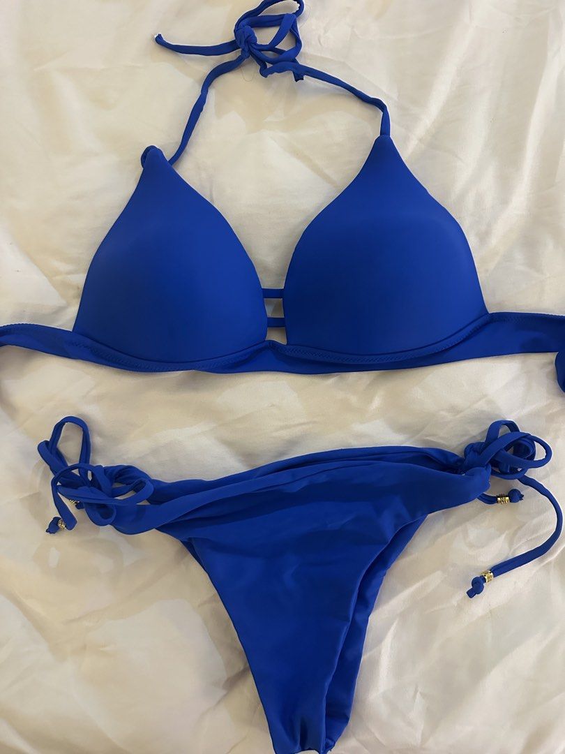 Royal Blue two piece Bikini Set with Tie Sides (Category: Bikinis & Swimsuits) located in Quezon City. Submitted by talamnl (Listing ID 1445398230, Image 2). Description: - padded two-piece bikini set - Halter neck top with adjustable ties - Bottoms - adjustable side ties - Chic gold accents on the bikini bottoms Used once .
