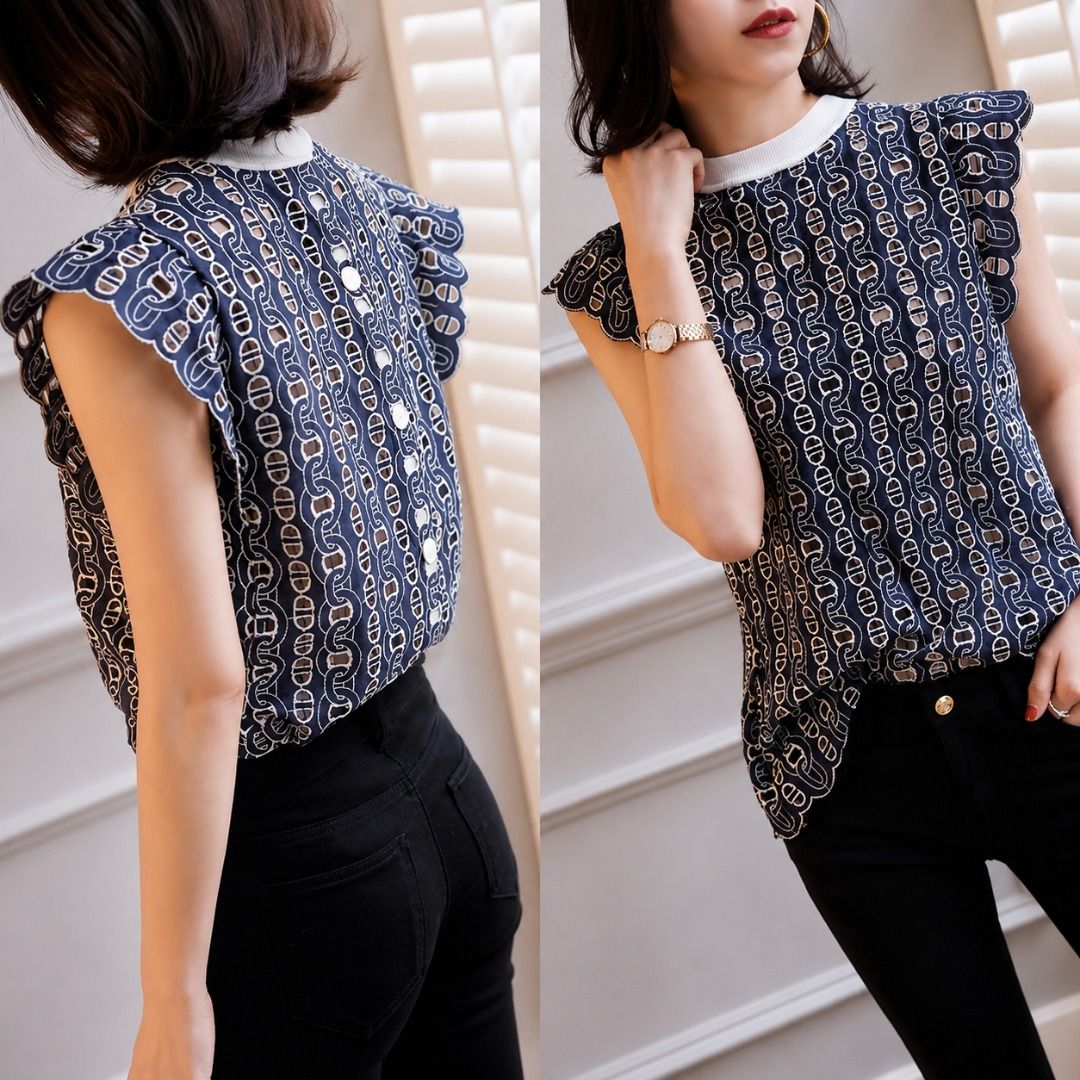 Sandro Inspired Navy White Chain-Link Pattern Guipure Lace Blouse (Category: Blouses) located in Quezon City. Submitted by qratedmnl (Listing ID 1445417691, Image 1). Description: 📌 ITEM DESCRIPTION Sandro inspired top featuring a navy and white chain-link patterned guipure lace with a contrast white rib-knit neckline. Flutter cap sleeves. Button-front back. Size 2 on tag. Approximate measurements when laid flat: Shoulder: 12 inches Bust: 18 inc