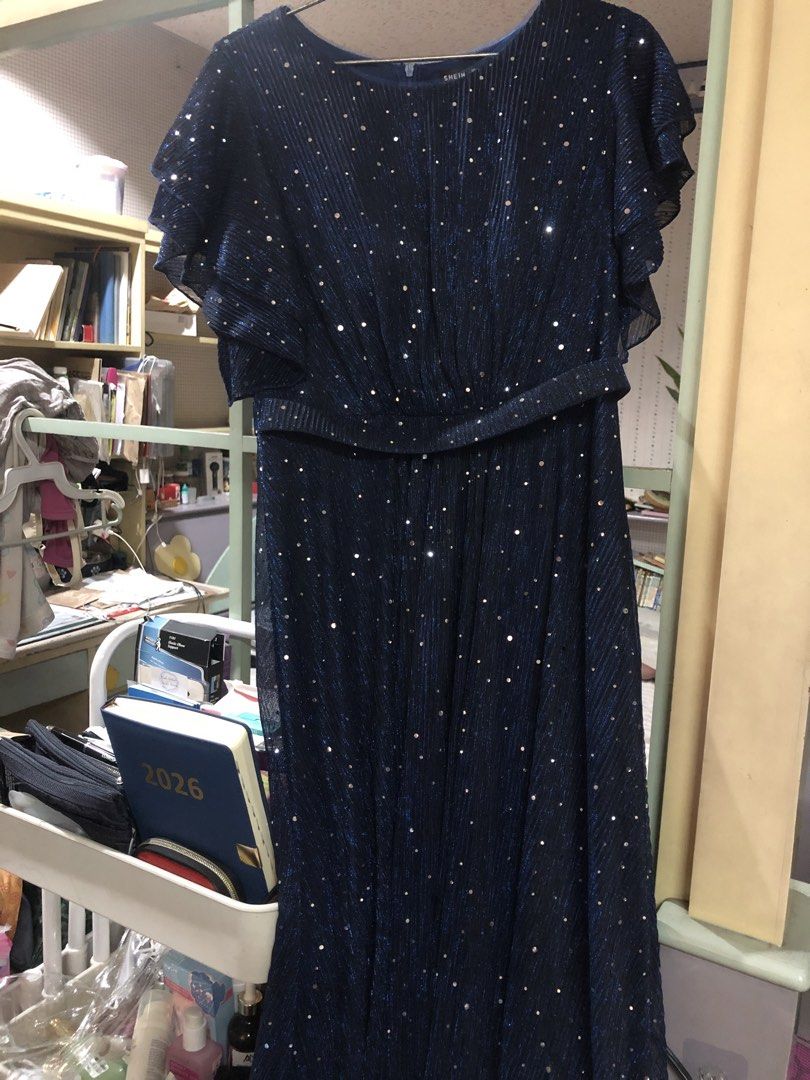 SHEIN Navy Blue Sparkly Maxi Dress (Category: Dresses) located in Caloocan City. Submitted by susanramos (Listing ID 1445289743, Image 2). Description: - Navy blue maxi dress - All-over sparkly details - Short flutter sleeves - Cinched waist - Ideal for parties or special occasions - Size: Medium (M) - Brand: SHEIN.