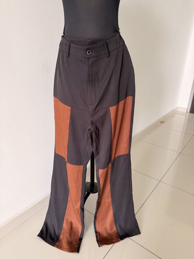 SHEIN Patchwork Flare Pants (Category: Other Bottoms) located in Kuala Lumpur. Submitted by ndhrhmat (Listing ID 1445308626, Image 1). Description: - SHEIN Brown & Black Patchwork Flare Pants - Size: S - Closure: Button and zip - Style: Wide leg, flare - Condition: Brand new, never worn - Perfect for a bold, statement outfit.