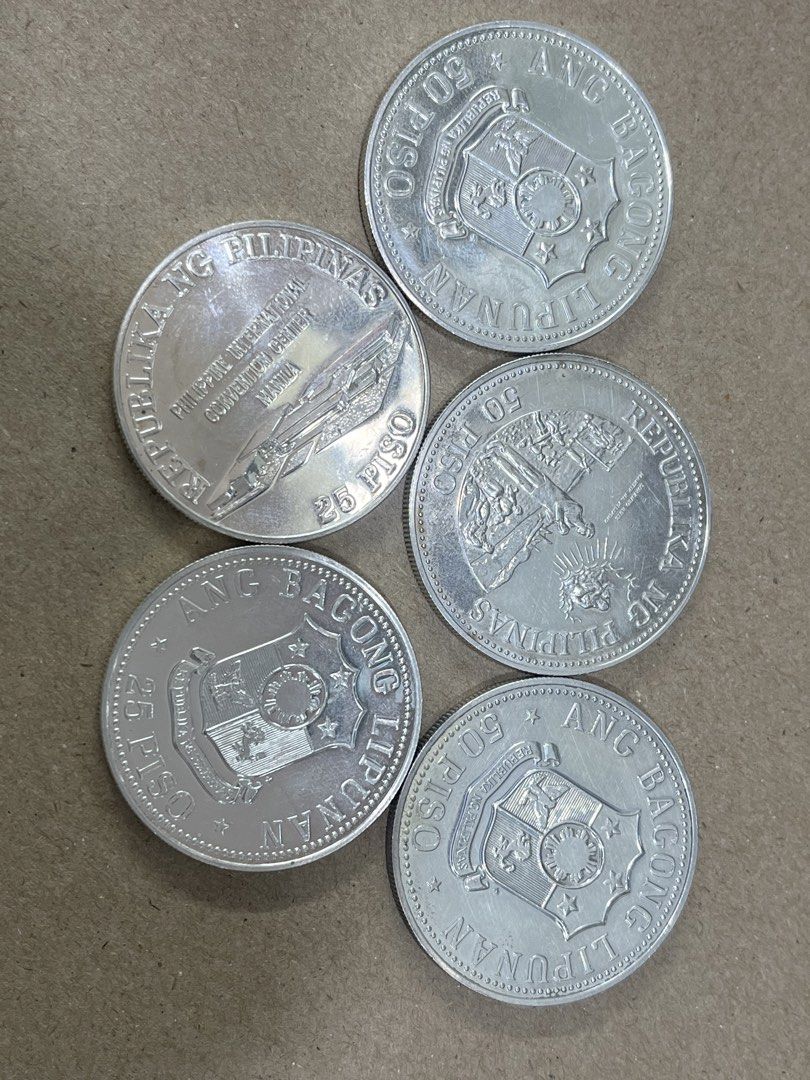 Silver Coins 25piso 50piso (Category: Currency) located in Malabon City. Submitted by jeferrer (Listing ID 1445405049, Image 3). Description: 50piso na lang available. 3k each 9k take all 3..