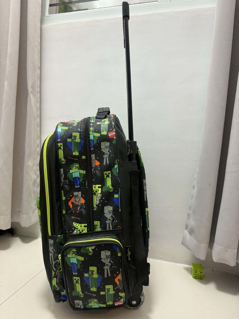 Smiggle Minecraft (Category: Backpacks) located in Quezon City. Submitted by thingsdeclutter (Listing ID 1445236267, Image 3). Description: Preloved but well loved Trolley or backpack With lights sa gulong With minor dents but hindi pansinin I can send video for those interested .