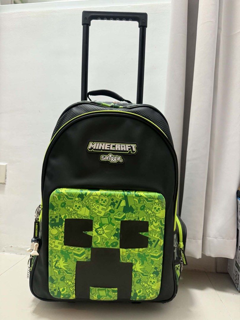 Smiggle Minecraft (Category: Backpacks) located in Quezon City. Submitted by thingsdeclutter (Listing ID 1445236267, Image 1). Description: Preloved but well loved Trolley or backpack With lights sa gulong With minor dents but hindi pansinin I can send video for those interested .