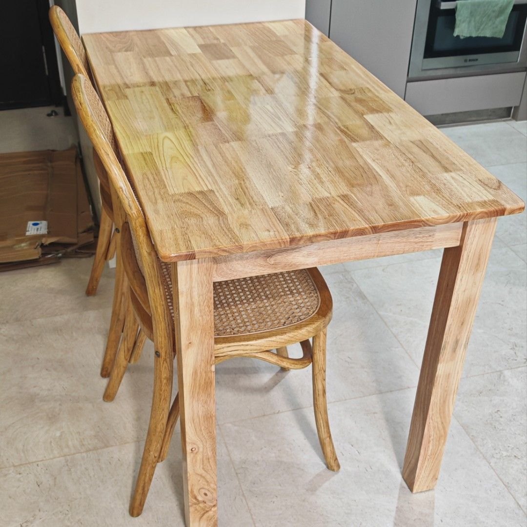 Solid Wood Dining Table (Category: Tables & Sets) located in Singapore. Submitted by rezaljr (Listing ID 1445330152, Image 3). Description: Solid wood dining table. Size: L120cm x W65cm x H75cm. In good condition. Selling table only. Price is fix. Self collection at Euhabitat Condo. Thank you :).