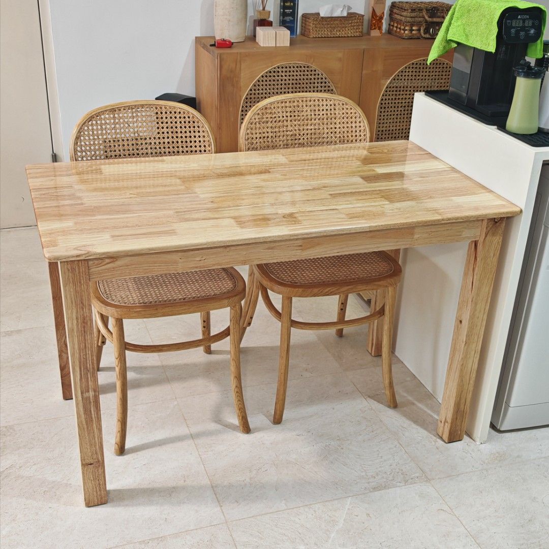 Solid Wood Dining Table (Category: Tables & Sets) located in Singapore. Submitted by rezaljr (Listing ID 1445330152, Image 2). Description: Solid wood dining table. Size: L120cm x W65cm x H75cm. In good condition. Selling table only. Price is fix. Self collection at Euhabitat Condo. Thank you :).