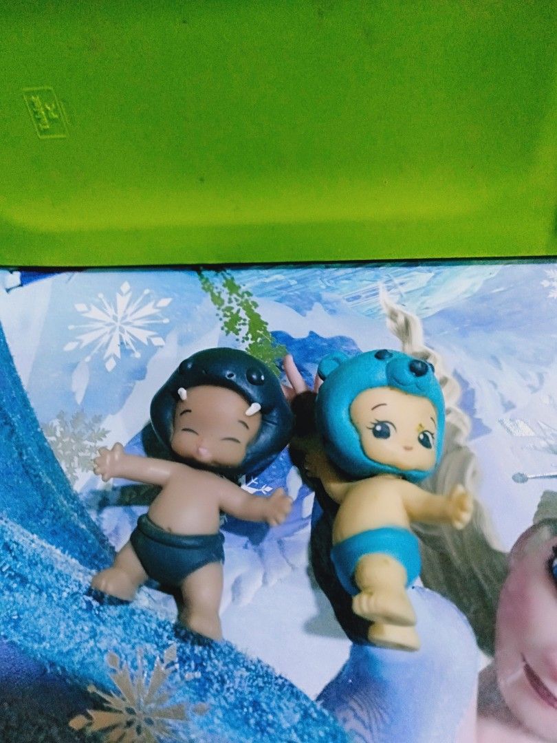 Sonny Angel Figures - Animal Series (Category: Designer & Blind Box Toys) located in Davao. Submitted by bravemoon_556cd5 (Listing ID 1445408489, Image 1). Description: - Two Sonny Angel collectible figures - One features a dark blue dinosaur-like helmet - The other has a light blue bear helmet - Both figures are wearing blue bottoms - Ideal for display or as a gift for collectors.