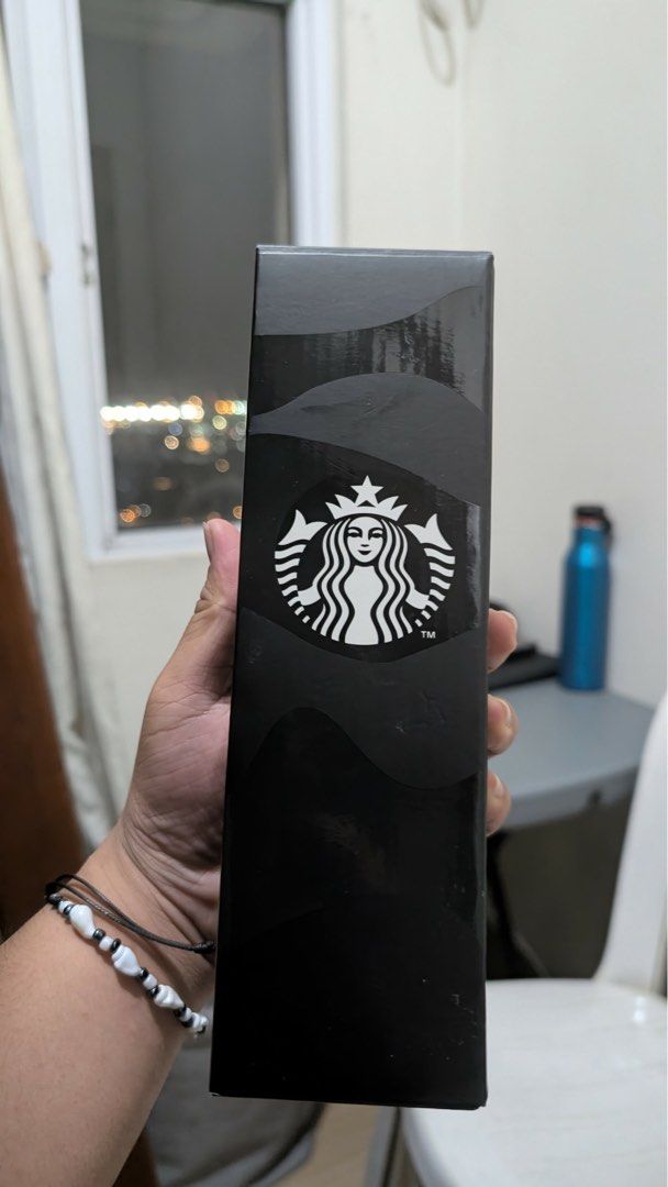 Starbucks Black Tumbler with Box (Category: Water Bottles & Tumblers) located in Cavite. Submitted by aikee__ (Listing ID 1445350511, Image 1). Description: 📍Manila - Authentic Starbucks tumbler in sleek black. - Comes with its original, protective box. - Stylish design with beige and grey wavy lines. - Ideal for keeping your coffee or tea hot or cold. - Convenient and easy to carry for your daily commute or travels..