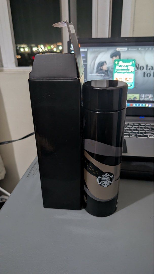 Starbucks Black Tumbler with Box (Category: Water Bottles & Tumblers) located in Cavite. Submitted by aikee__ (Listing ID 1445350511, Image 2). Description: 📍Manila - Authentic Starbucks tumbler in sleek black. - Comes with its original, protective box. - Stylish design with beige and grey wavy lines. - Ideal for keeping your coffee or tea hot or cold. - Convenient and easy to carry for your daily commute or travels..