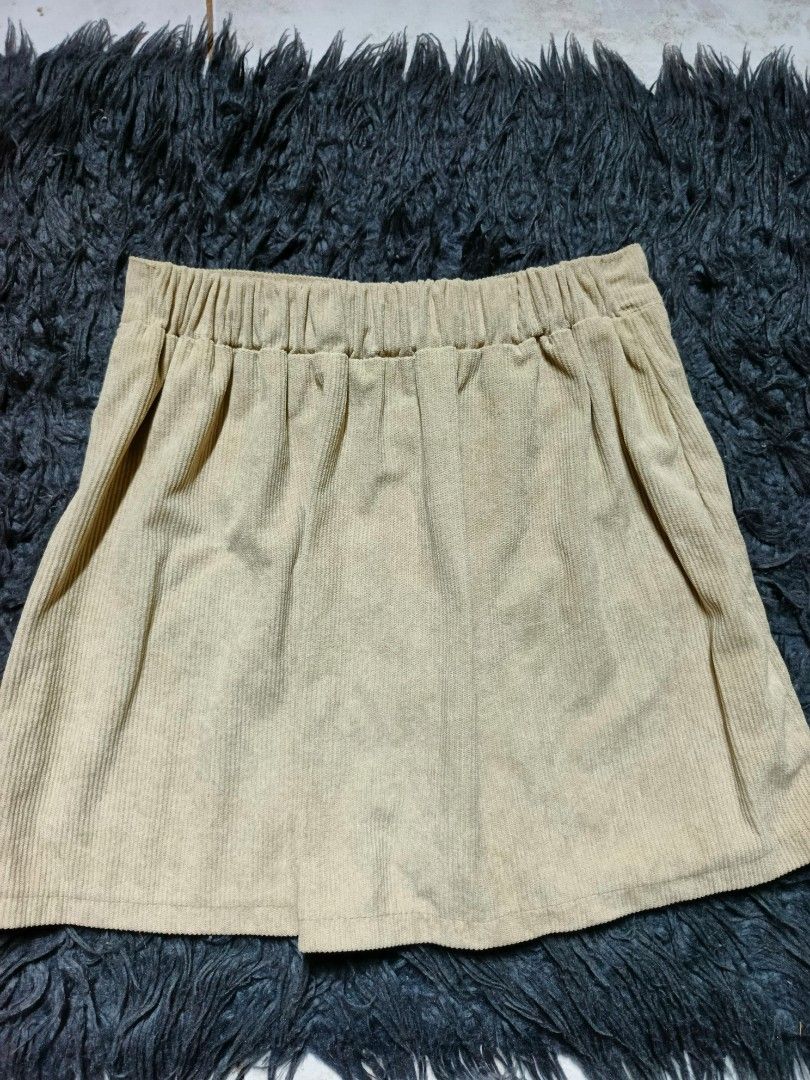 Tan Corduroy Button-Front A-Line Mini Skirt (Category: Skirts) located in Tagaytay City. Submitted by graceann06 (Listing ID 1445405378, Image 2). Description: - Cute tan corduroy skirt - Button front closure - Two functional front pockets - Elastic waistband at the back for a comfortable fit - Ideal for casual everyday wear - Versatile and easy to style.