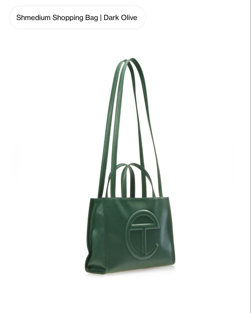 TELFAR SHMEDIUM SHOPPING BAG IN DARK OLIVE (Category: Cross-body Bags) located in Imus. Submitted by dumpitlikeaqueen (Listing ID 1445366848, Image 2). Description: • From the U.S. • 1 pc. only • ETA: 1st-2nd week of July 2026 • Open for layaway • Instagram Shop: @dumpitlikeaqueen.