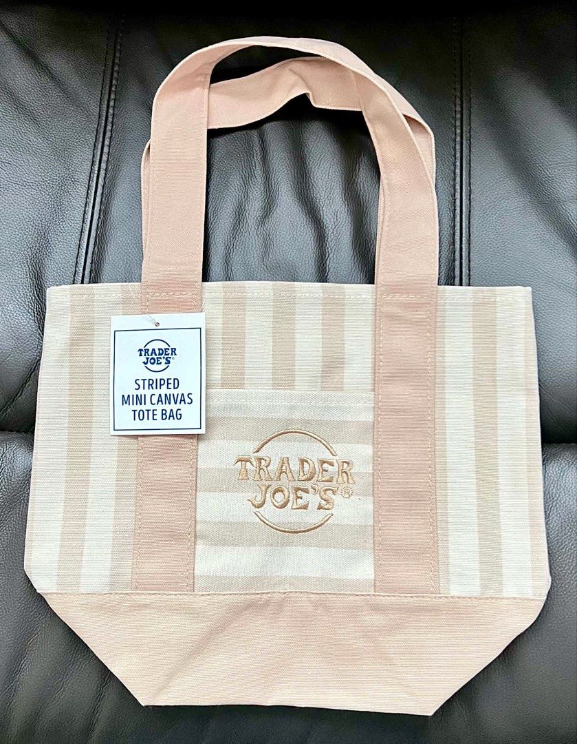Trader Joe's Striped Mini Canvas Tote Bag (Category: Tote Bags) located in Calasiao. Submitted by luvsha._ (Listing ID 1445279592, Image 2). Description: 𝐏𝐑𝐄-𝐎𝐑𝐃𝐄𝐑 ‎ ‎👜 Limited Edition Trader Joe's Striped Mini Tote Bag ‎ ‎A must-have everyday tote that's cute, stylish, and practical! ‎ ‎🇺🇸 US Pasabuy (100% authentic) ‎💌 ₱100 Downpayment (sure buyers only) ‎📦 ETA: September–October ‎ ‎Available Colors: ‎- Pale Pink ‎- Desert Sand ‎- 
