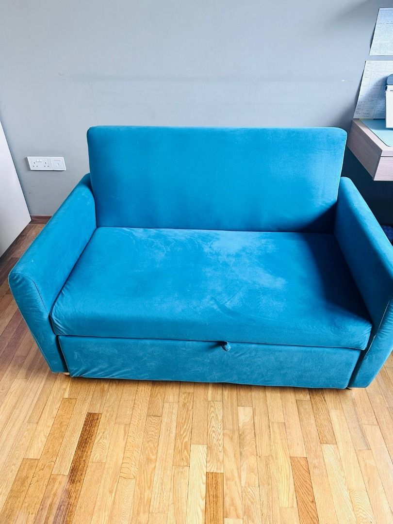 Turquoise Sofa Bed - Pull Out Bed Functionality (Category: Sofas) located in Singapore. Submitted by pinky.jaunt (Listing ID 1445250857, Image 3). Description: Selling a stylish, space-saving 2-seater sofa cum bed in a vibrant, gorgeous Turquoise fabric. Perfect for living rooms, guest rooms, or study rooms to accommodate overnight guests effortlessly! As seen in picture, it features a smooth pull-out mechanism with a handy fabric tab to easily t