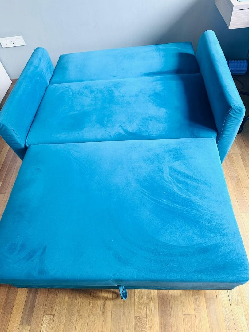 Turquoise Sofa Bed - Pull Out Bed Functionality (Category: Sofas) located in Singapore. Submitted by pinky.jaunt (Listing ID 1445250857, Image 2). Description: Selling a stylish, space-saving 2-seater sofa cum bed in a vibrant, gorgeous Turquoise fabric. Perfect for living rooms, guest rooms, or study rooms to accommodate overnight guests effortlessly! As seen in picture, it features a smooth pull-out mechanism with a handy fabric tab to easily t