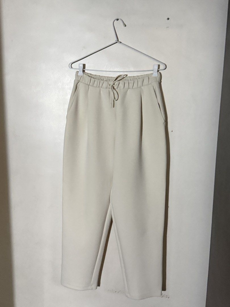 Uniqlo Cream High Waisted Drawstring Jogger Pants (Category: Other Bottoms) located in Angeles City. Submitted by endzn (Listing ID 1445326546, Image 3). Description: - Cream colored pants - High-waisted design - Drawstring detail - Cropped length - Convenient side pockets - Elastic waistband at the back for a comfortable fit - Simple and versatile, ideal for casual outfits - fits medium to large .
