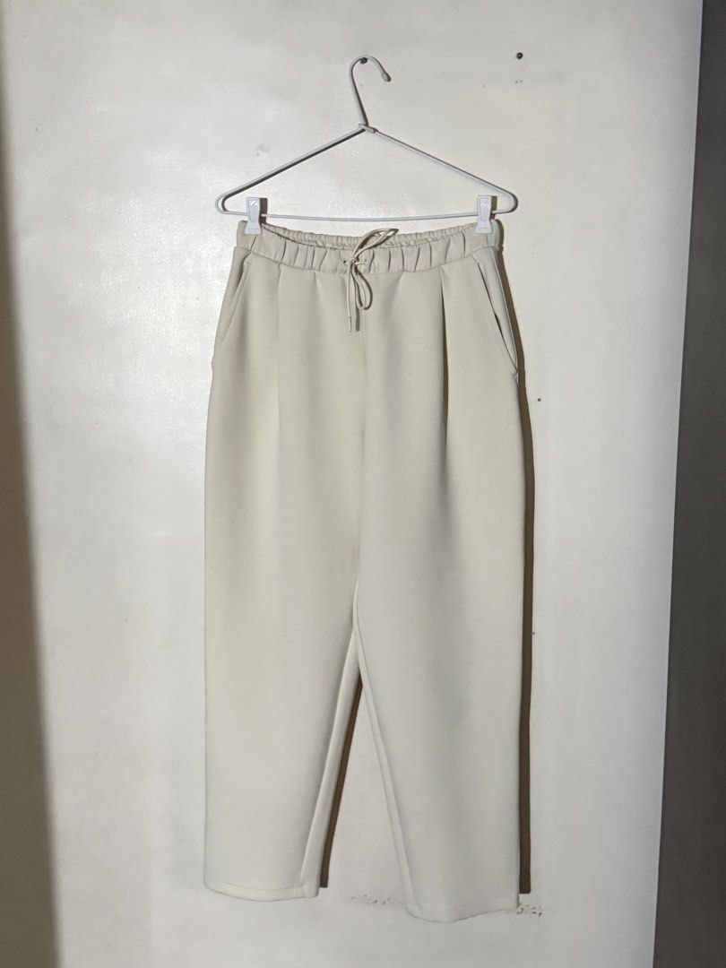 Uniqlo Cream High Waisted Drawstring Jogger Pants (Category: Other Bottoms) located in Angeles City. Submitted by endzn (Listing ID 1445326546, Image 1). Description: - Cream colored pants - High-waisted design - Drawstring detail - Cropped length - Convenient side pockets - Elastic waistband at the back for a comfortable fit - Simple and versatile, ideal for casual outfits - fits medium to large .