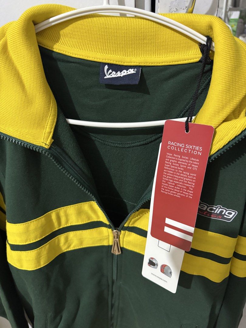 Vespa Racing Sixties Collection Jacket Green Yellow (Category: Coats, Jackets and Outerwear) located in Pasay City. Submitted by lovedbysants (Listing ID 1445374806, Image 2). Description: - Brand new Vespa jacket from the Racing Sixties Collection. - Stylish Green and Yellow colorway. - Full zip front with convenient pockets. - Comfortable ribbed collar, cuffs, and hem. - Made from a durable cotton and polyester blend. - Original tags still atta
