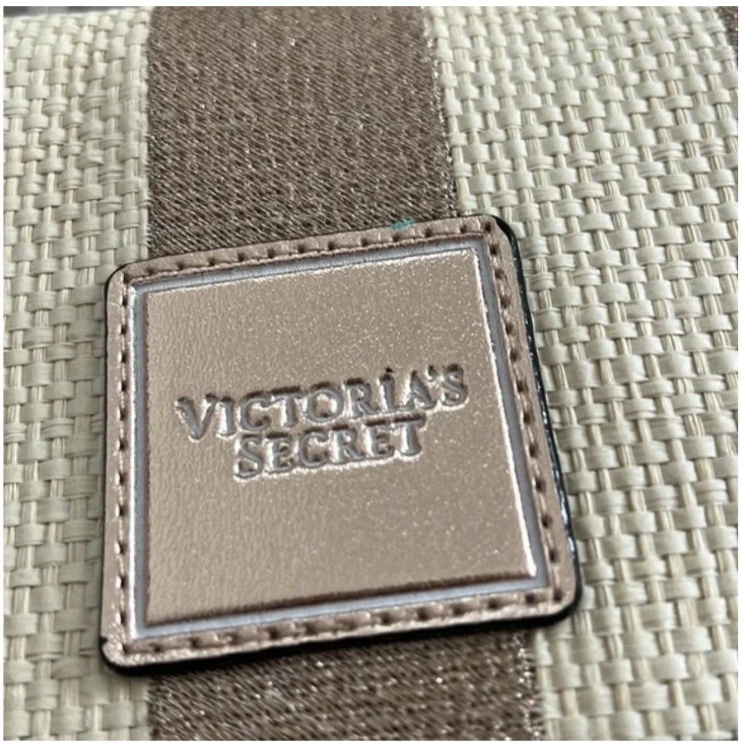 Victoria Secret Summer Clutch (Category: Purses & Pouches) located in San Pedro. Submitted by msela (Listing ID 1445337227, Image 3). Description: Victoria Secrer Summer Clutch in pretty beige with tan stripes. Snap shut.