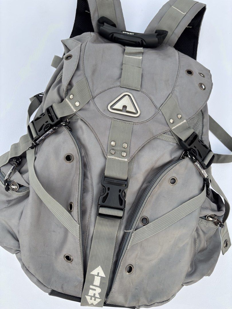 VINTAGE AIRWALK GRAY “OAKLEY VIBES” GORPCORE BACKPACK (Category: Backpacks) located in Baguio. Submitted by bl_thrift (Listing ID 1445363716, Image 2). Description: VINTAGE AIRWALK GRAY “OAKLEY VIBES” GORPCORE BACKPACK -very spacious -with mid AIRWALK icon -with lot of pockets -has cut on the strap -missing chest locks .