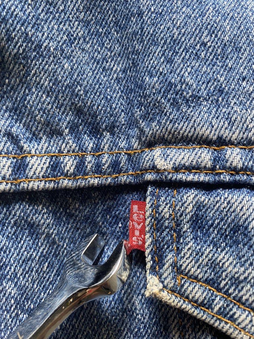 Vintage Levis Truck Jacket Sherpa lined (Category: Activewear) located in Dasmarinas. Submitted by ridgeridethrift (Listing ID 1445385761, Image 2). Description: 🚨Vintage Levis Denim Track Jacket Sherpa Lining ,Dated May , 1991 , Model no: 70609 The care tag is 527 Dimensions: Width - 25.5 Length - 26 Sleeve - 23.5 Excellent Condition: 9.5/10 - Color rate :9.8/10 Issue : , minor fade Price: 📥 Buyer will pay shipping fee 📖Read the Caption And C