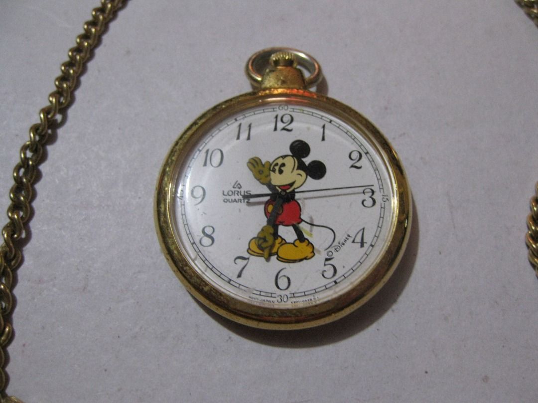 Vintage Lorus Mickey Mouse Pocket Watch & Chain (Category: Vintage Collectibles) located in Baguio. Submitted by mrbrunno (Listing ID 1445249104, Image 3). Description: Vintage Lorus Mickey Mouse Pocket Watch & Chain In Very good condition as seen in pics. 1990 Working, just needs new battery. Part of my Disney/Mickey watch collection. 1 .