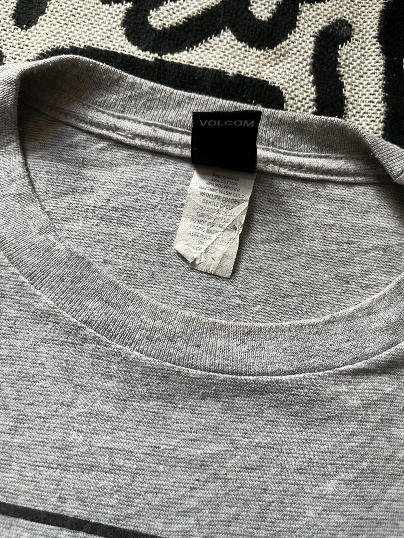 Volcom "True to This" Grey T-Shirt (Category: Tshirts & Polo Shirts ) located in Silang. Submitted by yusthrift (Listing ID 1445277562, Image 3). Description: - Grey Volcom T-Shirt - Features 'True to This' graphic and MCMXCI detail - Short sleeves and crew neck design - Comfortable cotton blend fabric - Ideal for casual outings and everyday wear Size: M on tag 19.5 inc width 28 inc length No issue Very good condition .