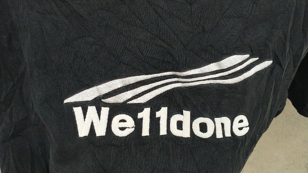WE11DONE EMBROIDERY LOGO SHIRT (Category: Formal Shirts) located in Pili. Submitted by janrypalmerodelima (Listing ID 1445344564, Image 2). Description: WE11DONE EMBROIDERY SHIRT DIMES: 25x21 CONDITION: VERY GOOD COLOR RATE: 9.3/10 ISSUE: NONE.