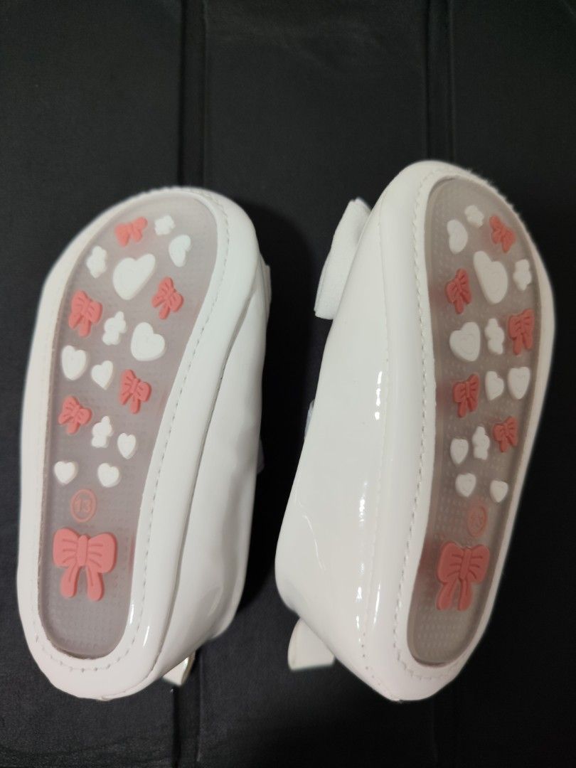 White Baby Shoes (Category: Babies & Kids Fashion) located in Guagua. Submitted by eacords (Listing ID 1445322985, Image 2). Description: Easy to put on and take off baby shoes. Used only once during my daughter's baptism. .