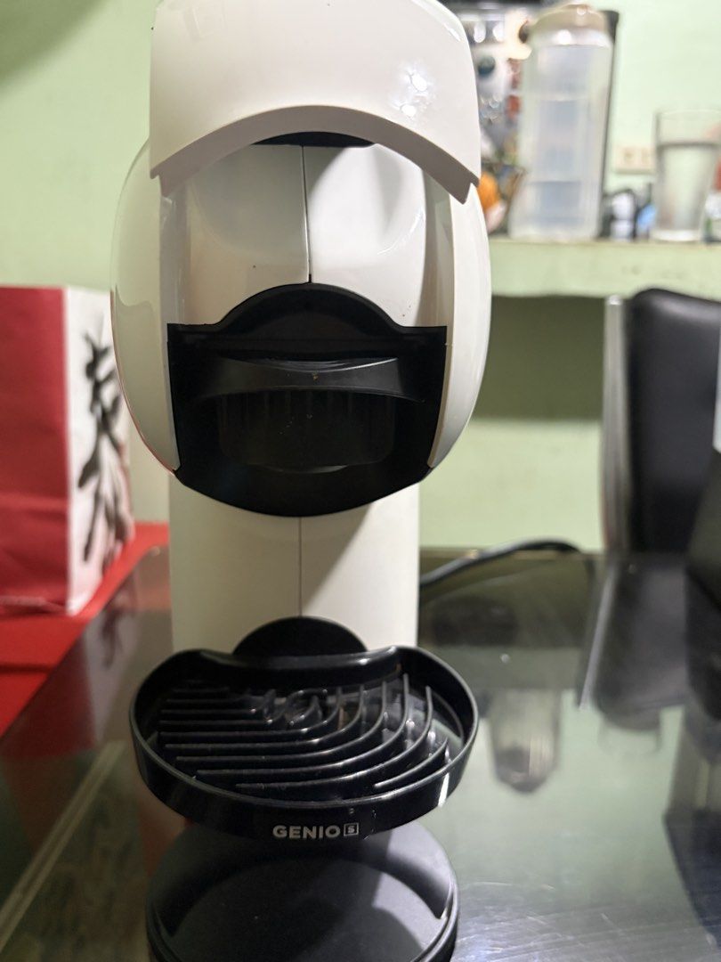White Nescafé Dolce Gusto Genio S Coffee Machine (Category: Coffee Machines & Makers) located in Manila. Submitted by boldturtle_59402b (Listing ID 1445350497, Image 3). Description: - White Nescafé Dolce Gusto Genio S coffee machine - Features side water tank and drip tray - Top controls for temperature and cup size adjustment - Ready for a new home.