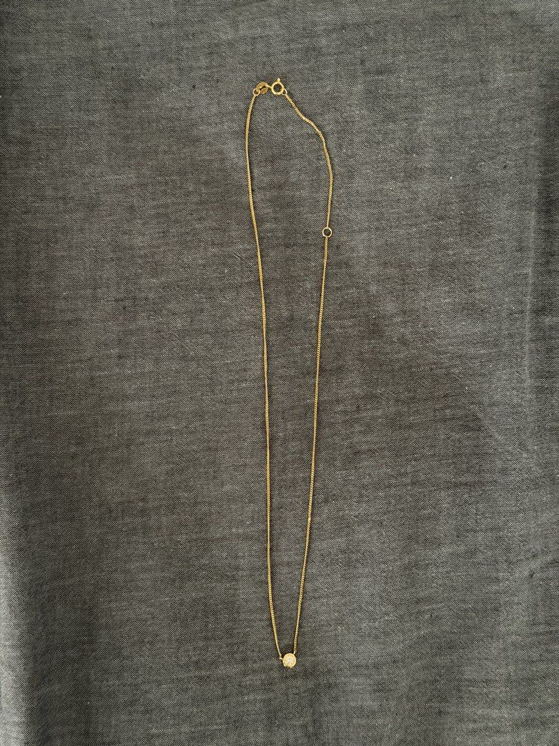 18k gold round diamond bezel necklace (Category: Necklaces) located in Marikina City. Submitted by eggugu (Listing ID 1445467210, Image 1). Description: Bought for around 7k .15ct diamond (as far as I know it's VS/SI, J-K color) Chain was repaired once (see 2nd to the last photo).