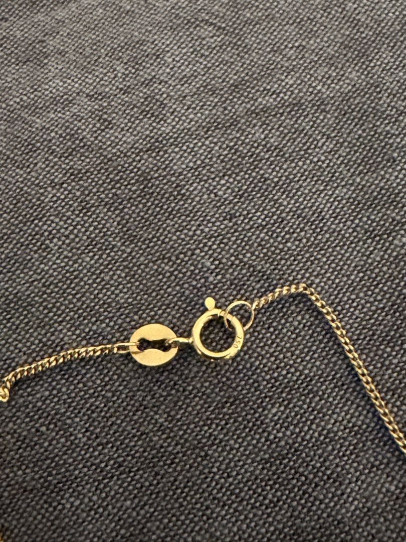 18k gold round diamond bezel necklace (Category: Necklaces) located in Marikina City. Submitted by eggugu (Listing ID 1445467210, Image 2). Description: Bought for around 7k .15ct diamond (as far as I know it's VS/SI, J-K color) Chain was repaired once (see 2nd to the last photo).
