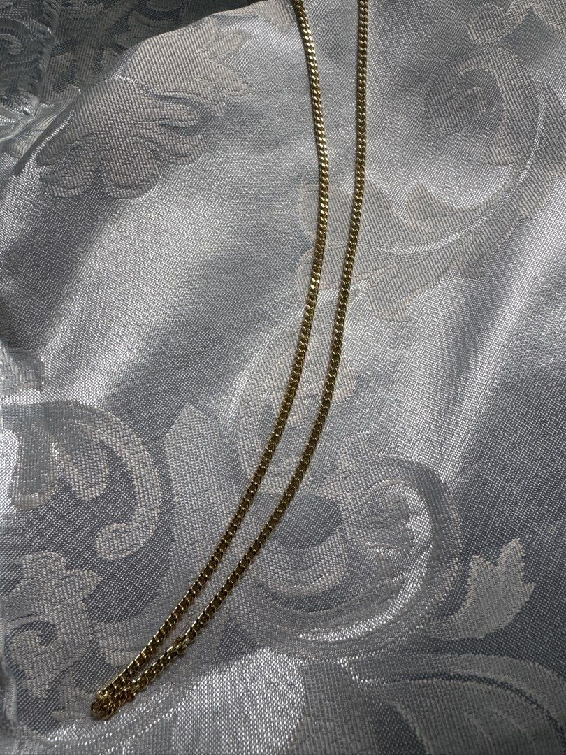 24 inches Gold Chain Necklace (Category: Necklaces) located in Angono. Submitted by gnnkl (Listing ID 1445505813, Image 3). Description: - Classic curb link gold chain necklace - Secure clasp closure - 24 inches long - Lightweight and comfortable for everyday wear - Ideal for layering with other jewelry Note: not real gold po.