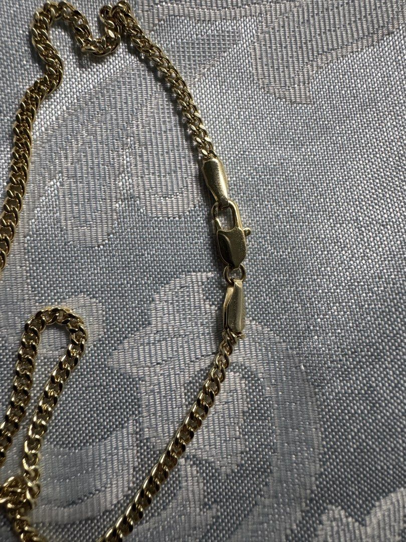24 inches Gold Chain Necklace (Category: Necklaces) located in Angono. Submitted by gnnkl (Listing ID 1445505813, Image 2). Description: - Classic curb link gold chain necklace - Secure clasp closure - 24 inches long - Lightweight and comfortable for everyday wear - Ideal for layering with other jewelry Note: not real gold po.