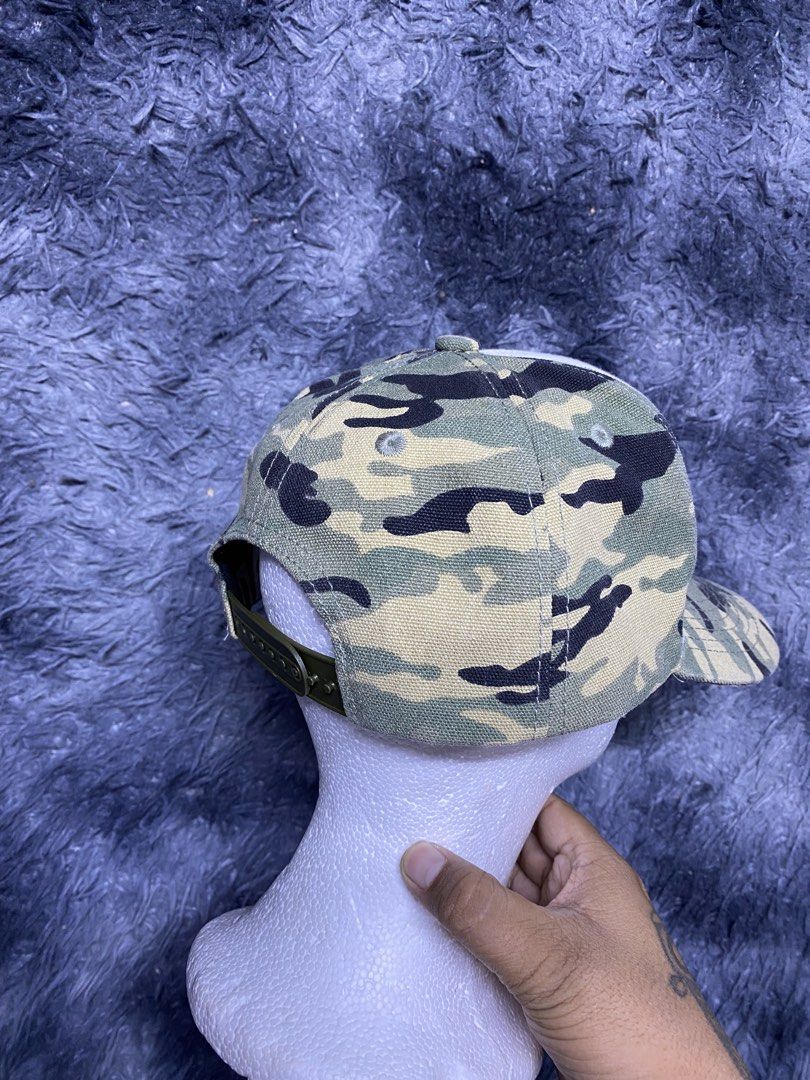 A Bathing Ape "1st Camo" trucker cap (Category: Caps & Hats) located in Makati City. Submitted by drip.poww (Listing ID 1445580351, Image 2). Description: - A Bathing Ape - Trucker cap - Size: Free size - Authentic - Excellent condition - Need wash, fresh from bale - Material: 100% Cotton !!STILL NEGOTIABLE!!.