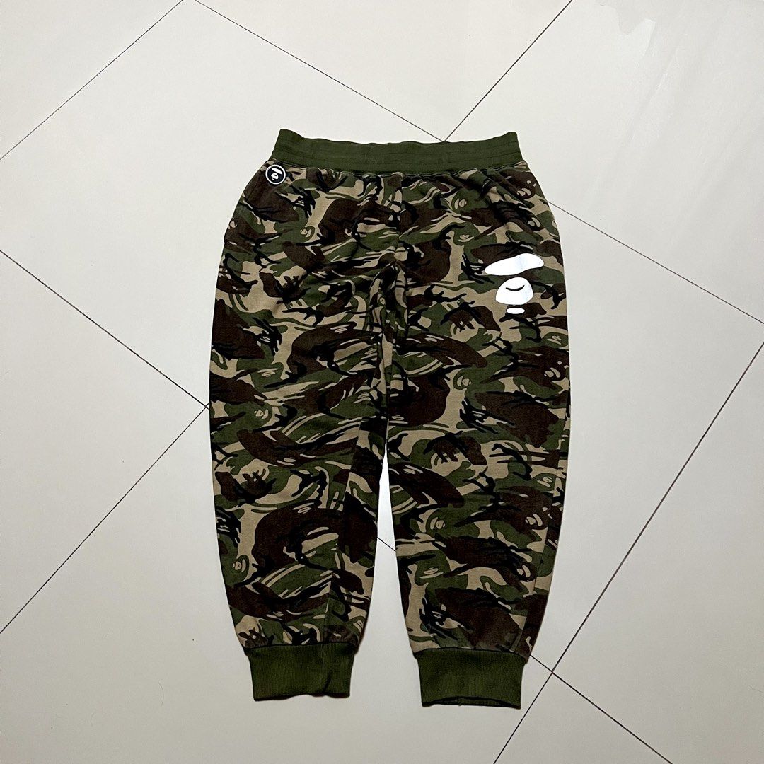 AAPE BY A BATHING APE CAMOUFLAGE PANTS (Category: Joggers) located in Pasig City. Submitted by mr.mabisa (Listing ID 1445505811, Image 1). Description: AAPE BY A BATHING APE CAMOUFLAGE PANTS.