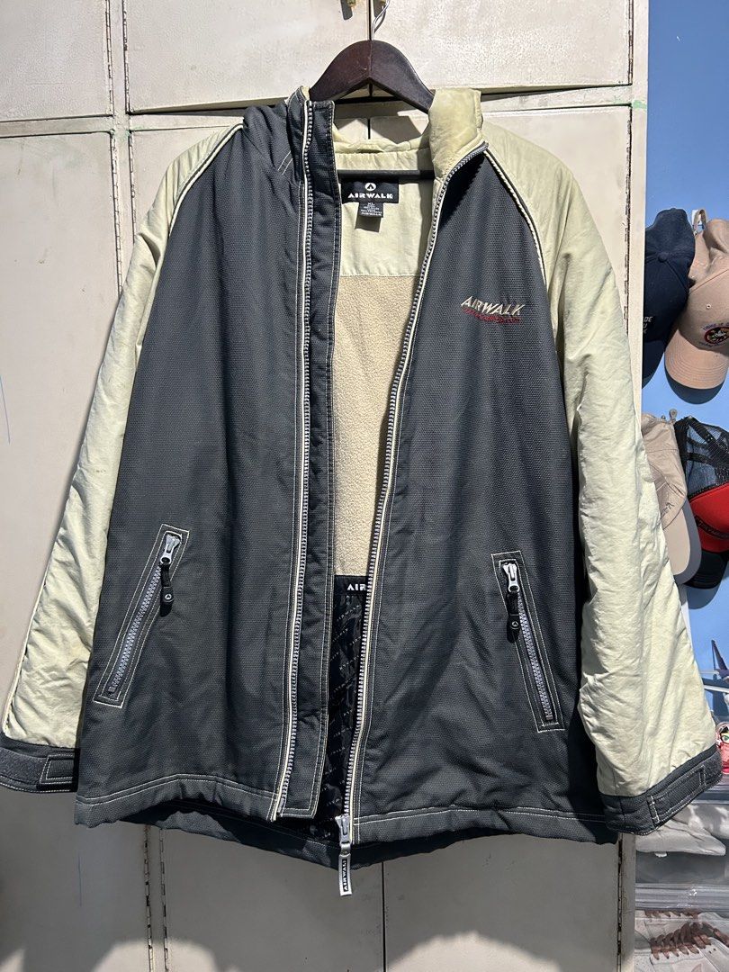 Airwalk Hooded Jacket XL Grey Beige (Category: Coats, Jackets and Outerwear) located in Cavite. Submitted by michrolfe (Listing ID 1445525429, Image 1). Description: - Airwalk hooded jacket - Size: XL - Color: Grey and Beige - Material: 100% Nylon shell, 100% Polyester fleece lining - Features: Fleece-lined interior for extra warmth, two zippered front pockets, attached hood - Ideal for: Cooler weather and staying cozy.