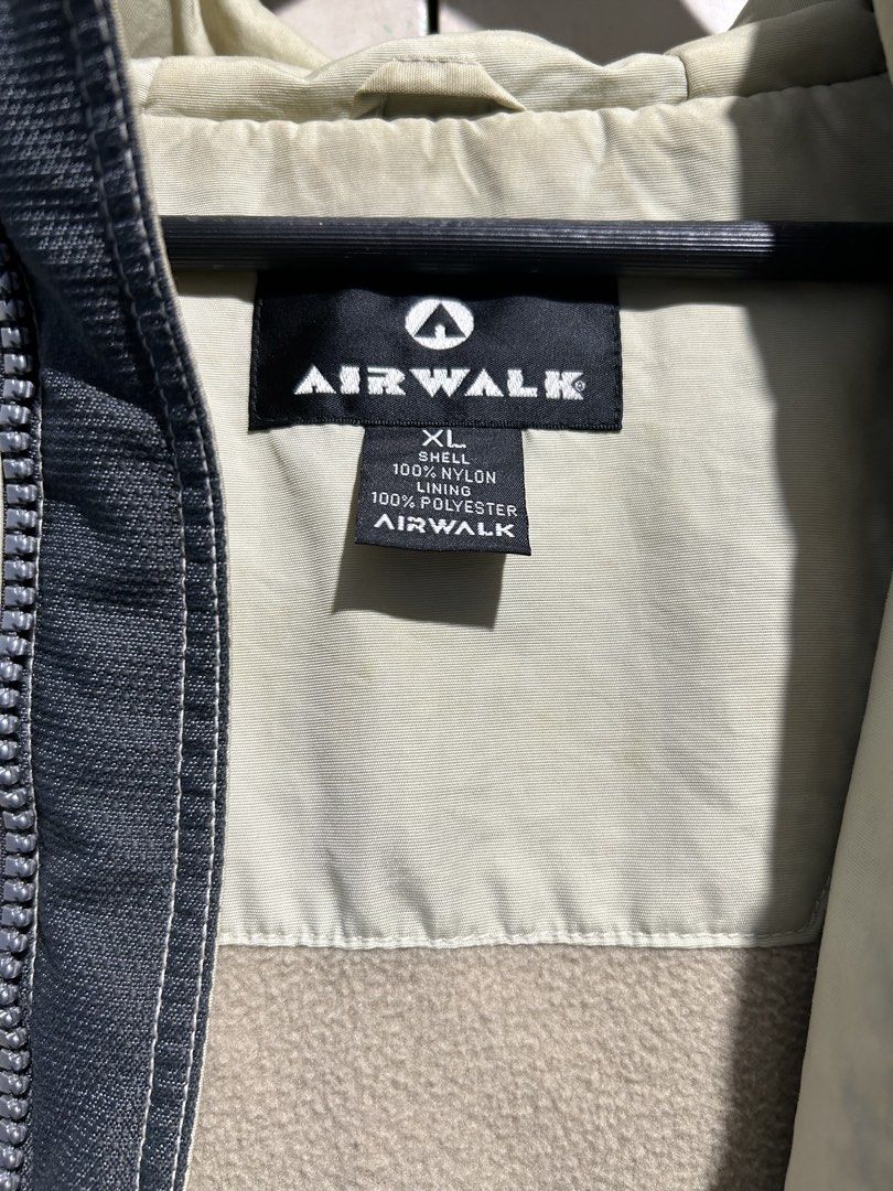Airwalk Hooded Jacket XL Grey Beige (Category: Coats, Jackets and Outerwear) located in Cavite. Submitted by michrolfe (Listing ID 1445525429, Image 3). Description: - Airwalk hooded jacket - Size: XL - Color: Grey and Beige - Material: 100% Nylon shell, 100% Polyester fleece lining - Features: Fleece-lined interior for extra warmth, two zippered front pockets, attached hood - Ideal for: Cooler weather and staying cozy.