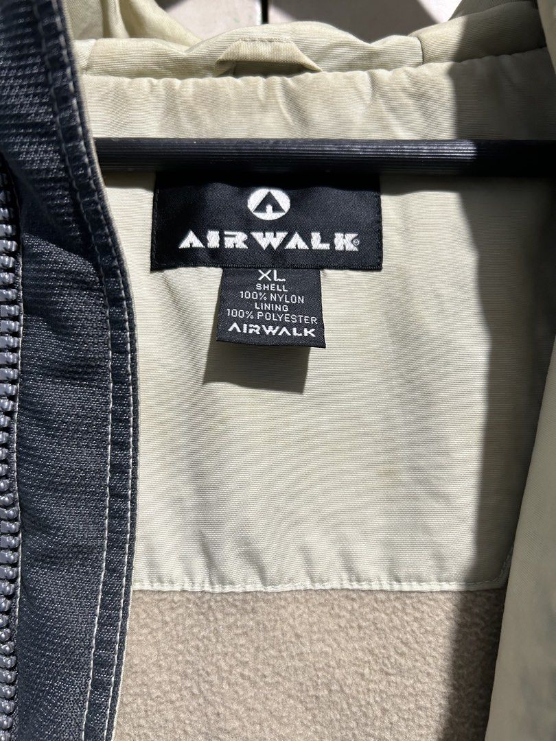 Airwalk Hooded Jacket XL Grey Beige (Category: Coats, Jackets and Outerwear) located in Cavite. Submitted by michrolfe (Listing ID 1445525429, Image 2). Description: - Airwalk hooded jacket - Size: XL - Color: Grey and Beige - Material: 100% Nylon shell, 100% Polyester fleece lining - Features: Fleece-lined interior for extra warmth, two zippered front pockets, attached hood - Ideal for: Cooler weather and staying cozy.