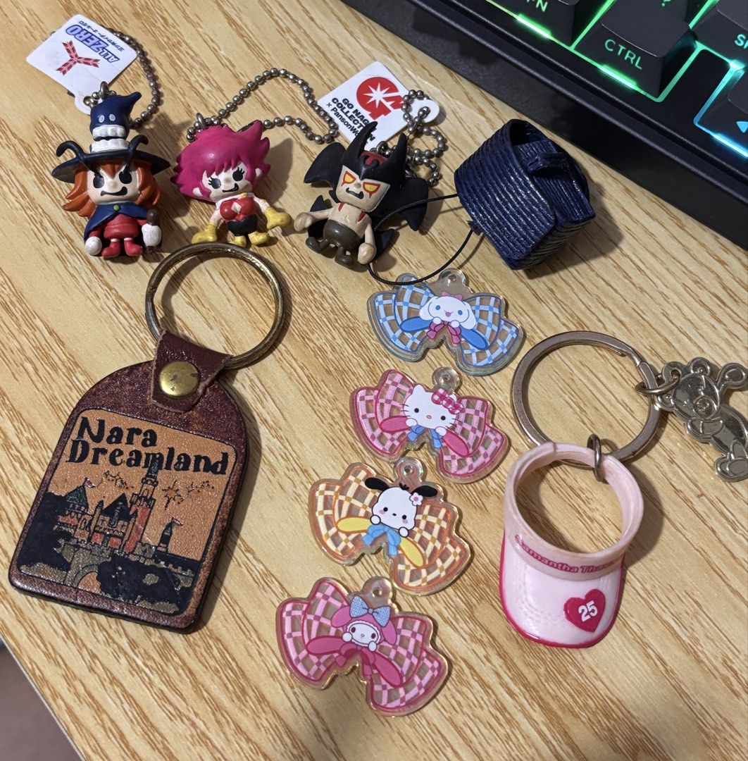 Assorted Keychains: Nara Dreamland, Sanrio, Anime Figures (Category: Character Goods) located in Manila. Submitted by margarital17893 (Listing ID 1445592270, Image 1). Description: - Nara Dreamland leather tag - 3 anime character figures - Assorted Sanrio character charms ( Kitty, Cinnamoroll, Pochacco, My Melody) - Pink visor charm - Ideal for collectors or personalizing your bag.