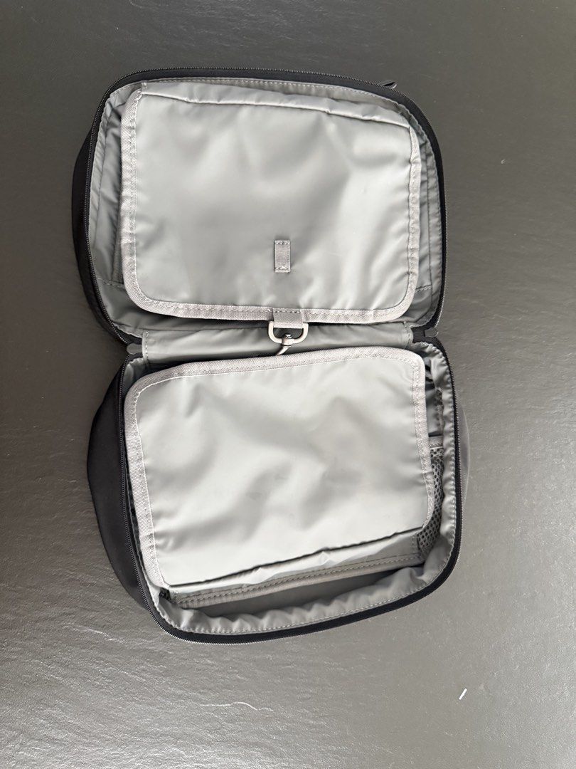Away Hanging Toiletry Bag Black (Category: Luxury Bags & Wallets) located in Manila. Submitted by ponyo.1 (Listing ID 1445435524, Image 2). Description: Material 100% recycled polyester, 51% recycled leather Dimensions 9.8” x 4.5” x 6.9” Capacity 4L Weight 0.7 lbs.