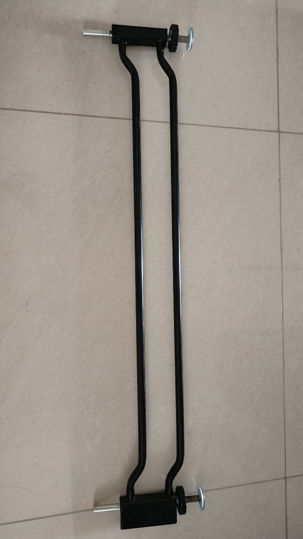 Baby Gate Extension Rods with Adjustable Knobs (Category: Safety Gates, Locks & Protectors) located in Singapore. Submitted by suhfen (Listing ID 1445467521, Image 1). Description: - Pair of black metal extension rods for baby gates - Features adjustable knobs for a secure and customizable fit - Designed for pressure-mounted gates - Effectively widens your existing gate opening - Perfect for creating a larger barrier.