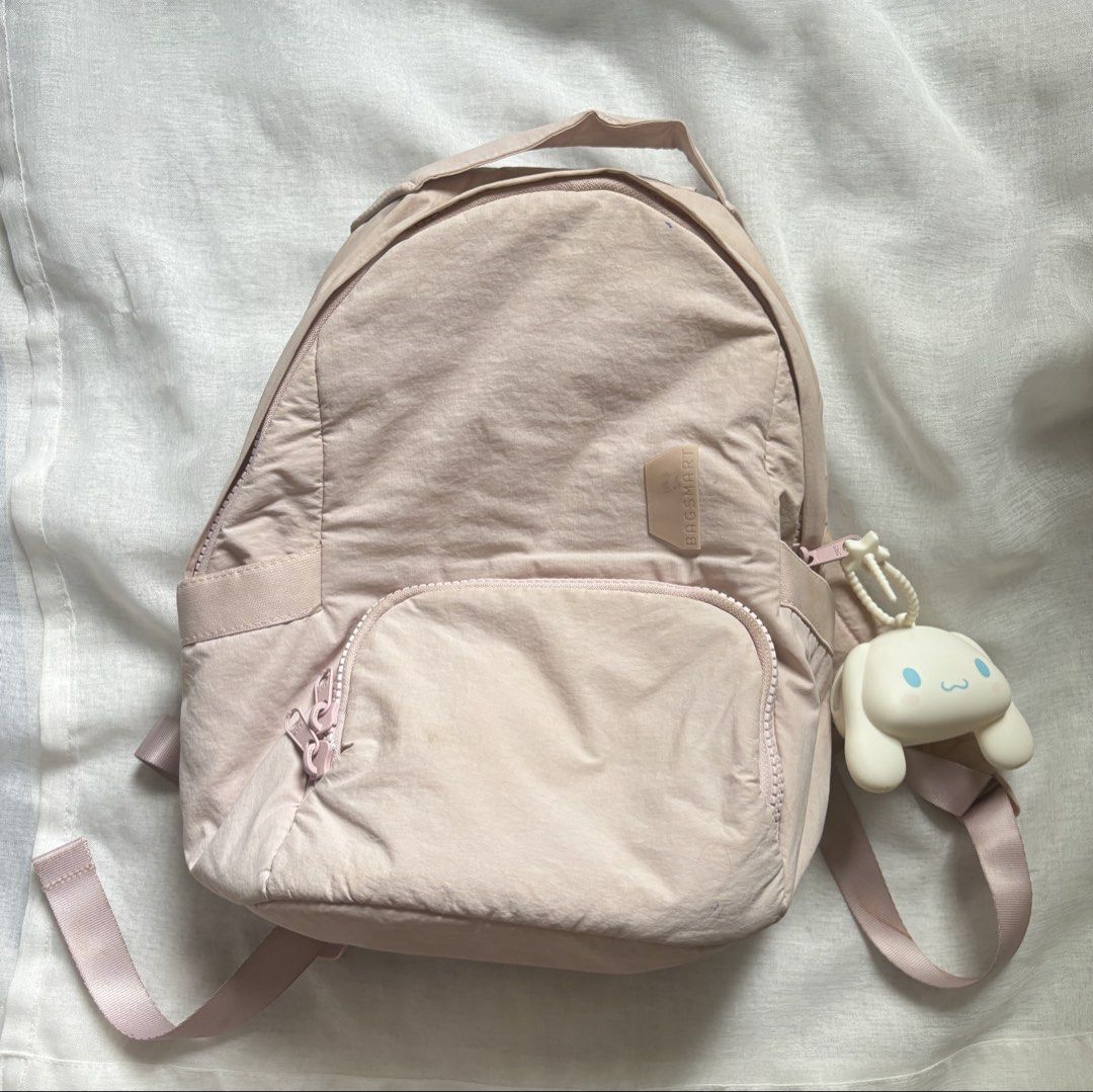 BAGSMART Pink Nylon Backpack with Cinnamoroll Charm (Category: Backpacks) located in Manila. Submitted by boldowl-25e17a (Listing ID 1445475255, Image 2). Description: -negotiable price -durable nylon material - many compartments - waterproof - only used for like 1 month - has washable stains from ballpens and little dirts - 13.3 inch.