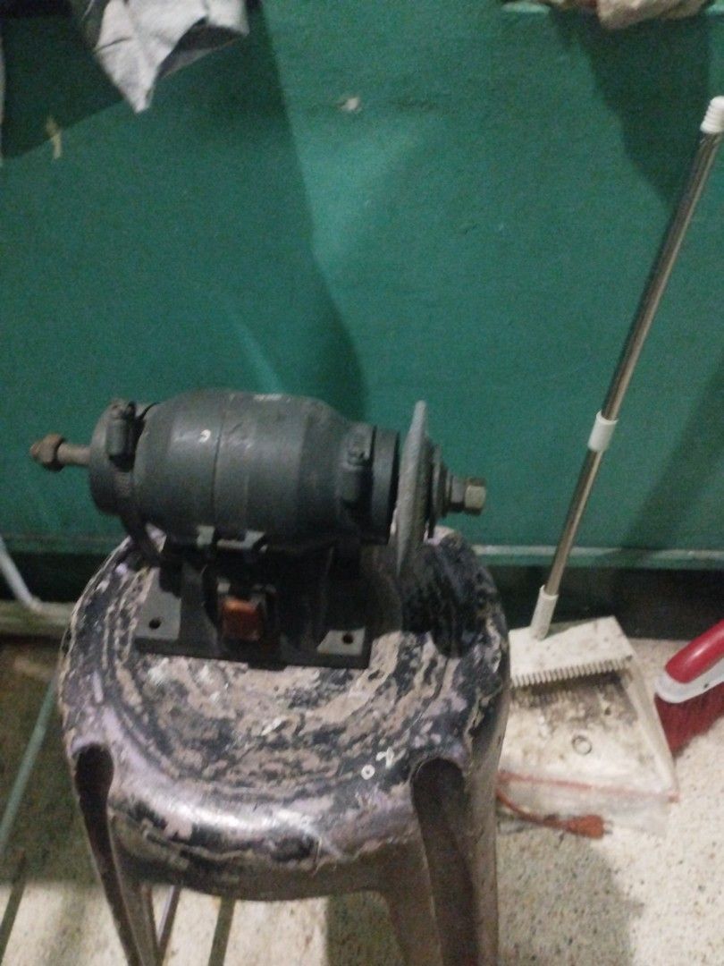 Bench Grinder with Grinding Wheel (Category: Construction Tools & Equipment) located in Manila. Submitted by deguzmandh17516 (Listing ID 1445572178, Image 2). Description: - Used bench grinder - Includes grinding wheel - Comes with extra sprockets/gears - Mounted on a stable base - Power cord included - Ideal for workshop use - Sold as is.