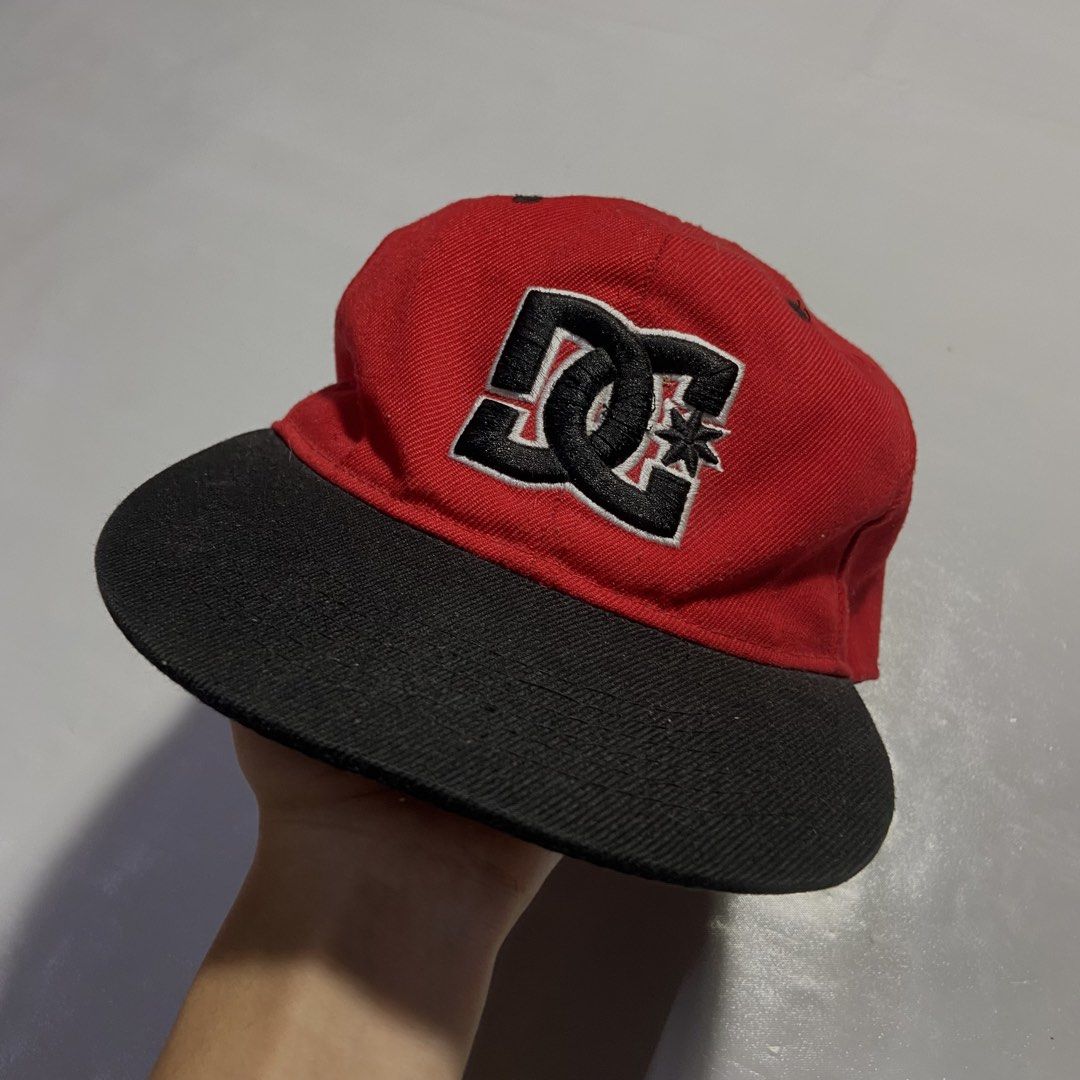 black DC Shoes snapback cap (Category: Caps & Hats) located in Manila. Submitted by tepthirft (Listing ID 1445562203, Image 1). Description: black DC Shoes snapback cap good condition no issue .