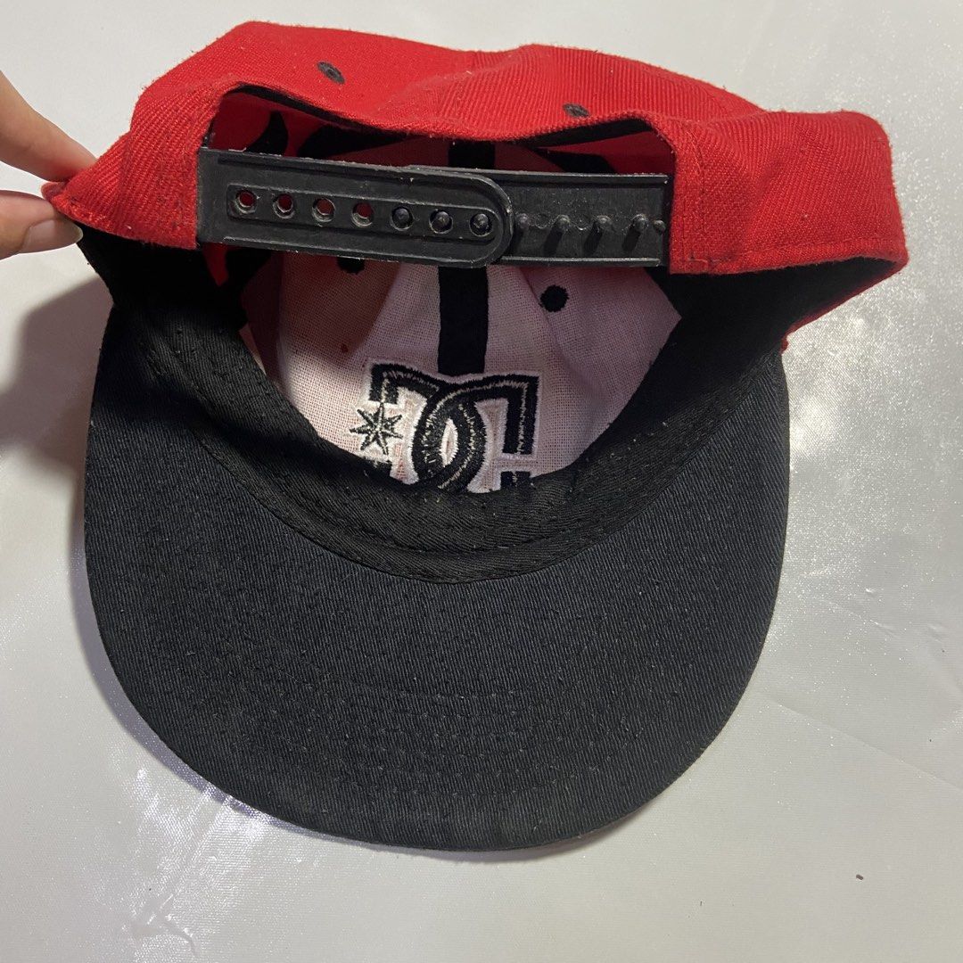 black DC Shoes snapback cap (Category: Caps & Hats) located in Manila. Submitted by tepthirft (Listing ID 1445562203, Image 2). Description: black DC Shoes snapback cap good condition no issue .
