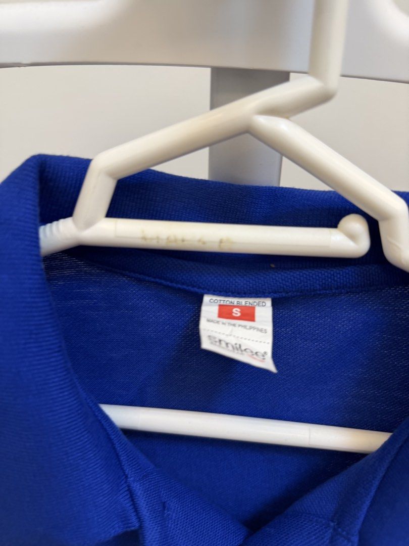 Blue Cotton Blend Polo Shirt - Size S (Category: Tshirts & Polo Shirts ) located in Manila. Submitted by everythinginbetweenbyk (Listing ID 1445570125, Image 2). Description: - Classic blue polo shirt - Short sleeves with collar and button placket - Comfortable cotton blend fabric - Proudly made in the Philippines - Ideal for casual wear or school uniform.