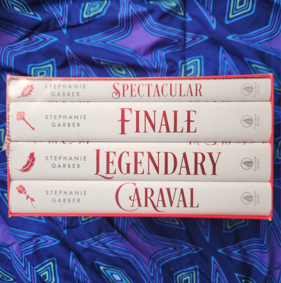Caraval Holiday Edition by Stephanie Garber (Category: Storybooks) located in Manila. Submitted by ShesTine (Listing ID 1445538441, Image 2). Description: - Caraval Holiday Collection Boxed Set - Sprayed Red Edges - Brand new and sealed packaging.