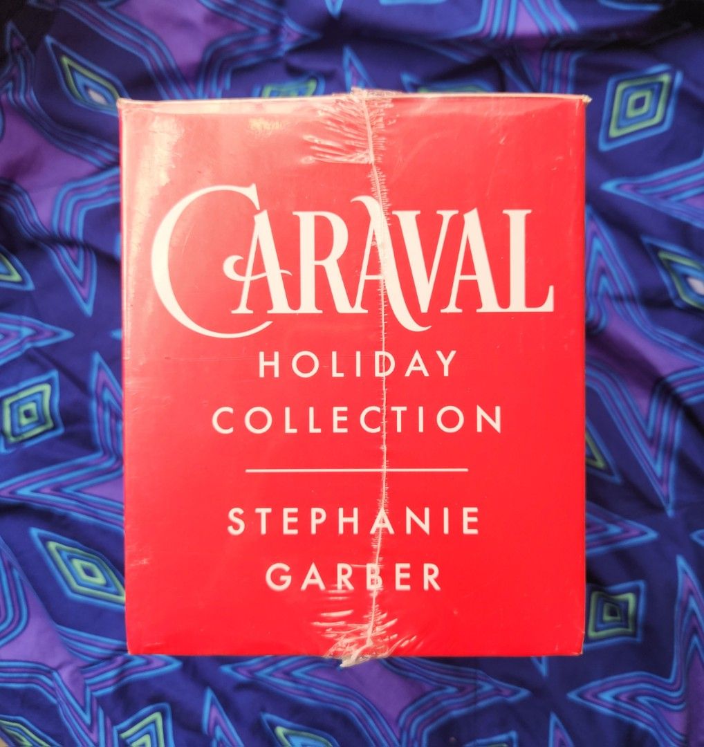 Caraval Holiday Edition by Stephanie Garber (Category: Storybooks) located in Manila. Submitted by ShesTine (Listing ID 1445538441, Image 1). Description: - Caraval Holiday Collection Boxed Set - Sprayed Red Edges - Brand new and sealed packaging.