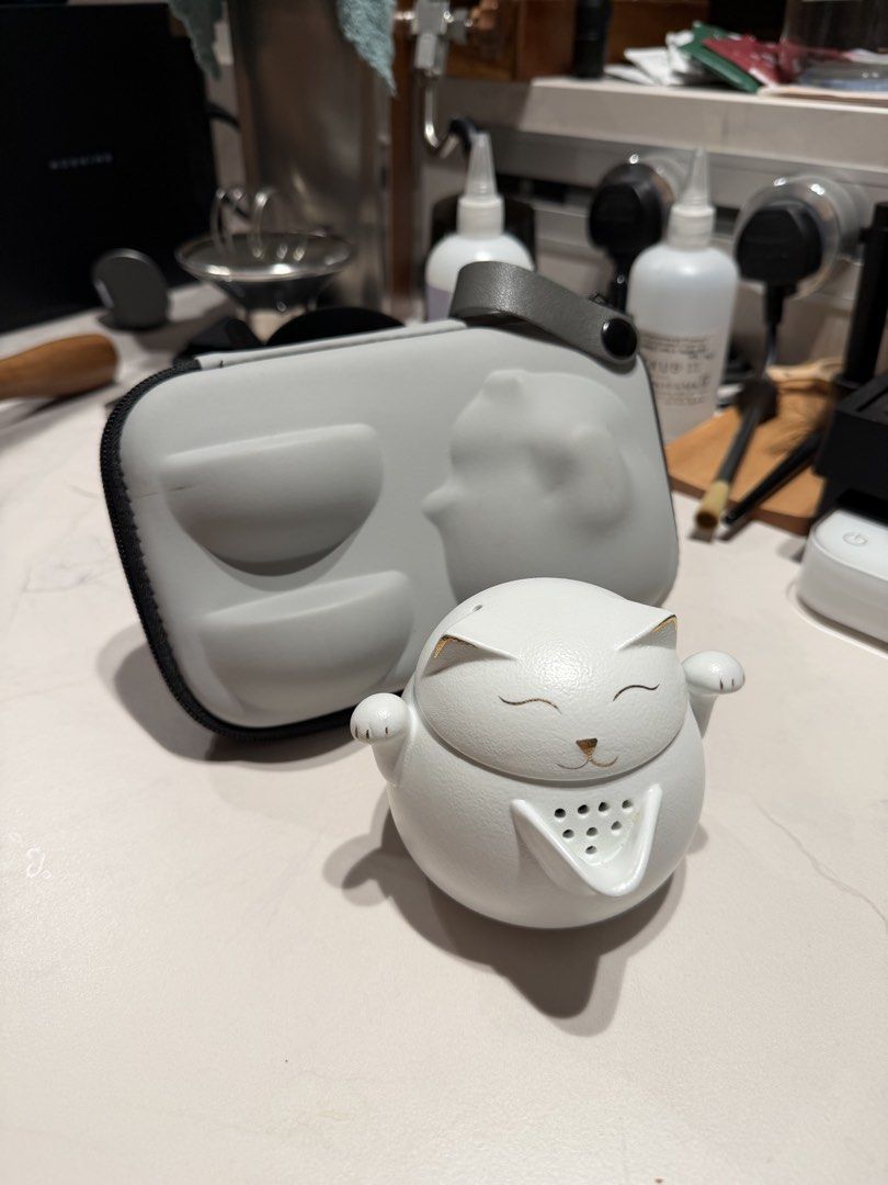 Cat tea pot490523194305423360