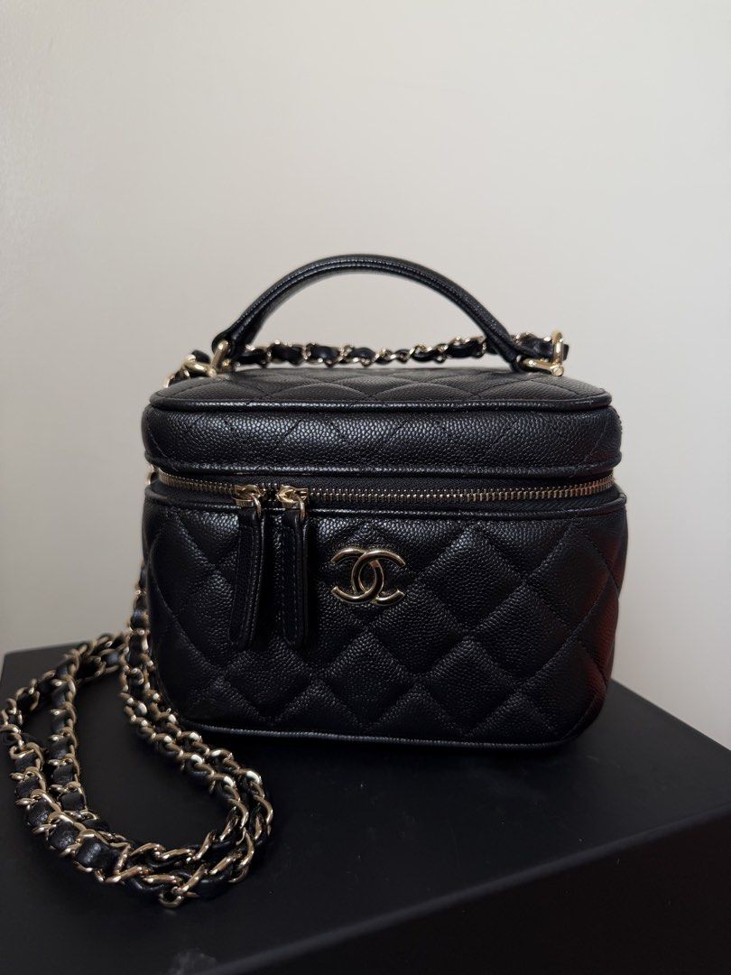 Chanel Black Quilted Vanity Case Bag with Chain (Category: Luxury Bags & Wallets) located in Quezon City. Submitted by _cherryontop_ (Listing ID 1445567937, Image 1). Description: Like new condition Microchip embed Box,dust bag,authentication.